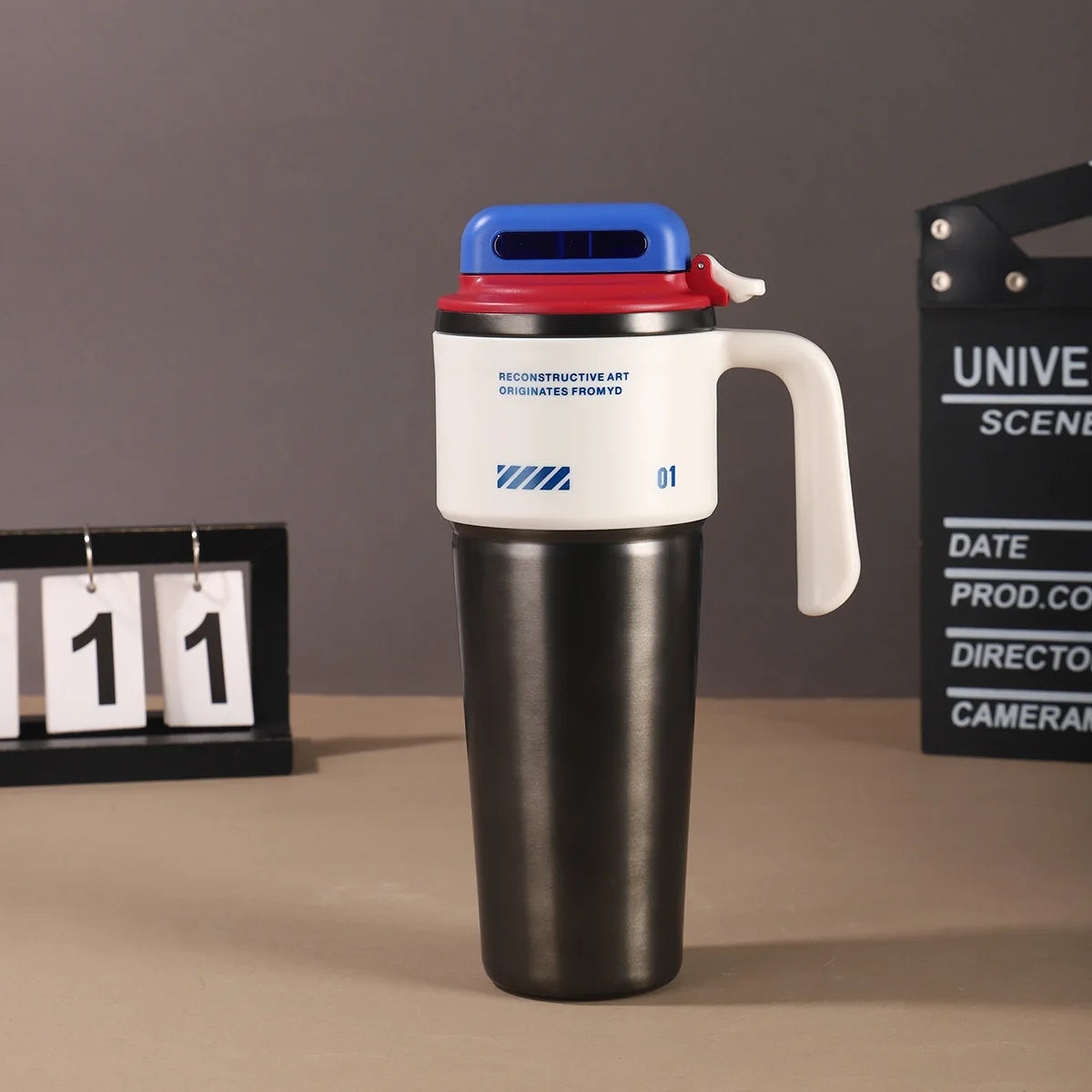 Robo-armor-style portable insulated cup with built-in sport mode quick-open straw and car-mounted ice maker